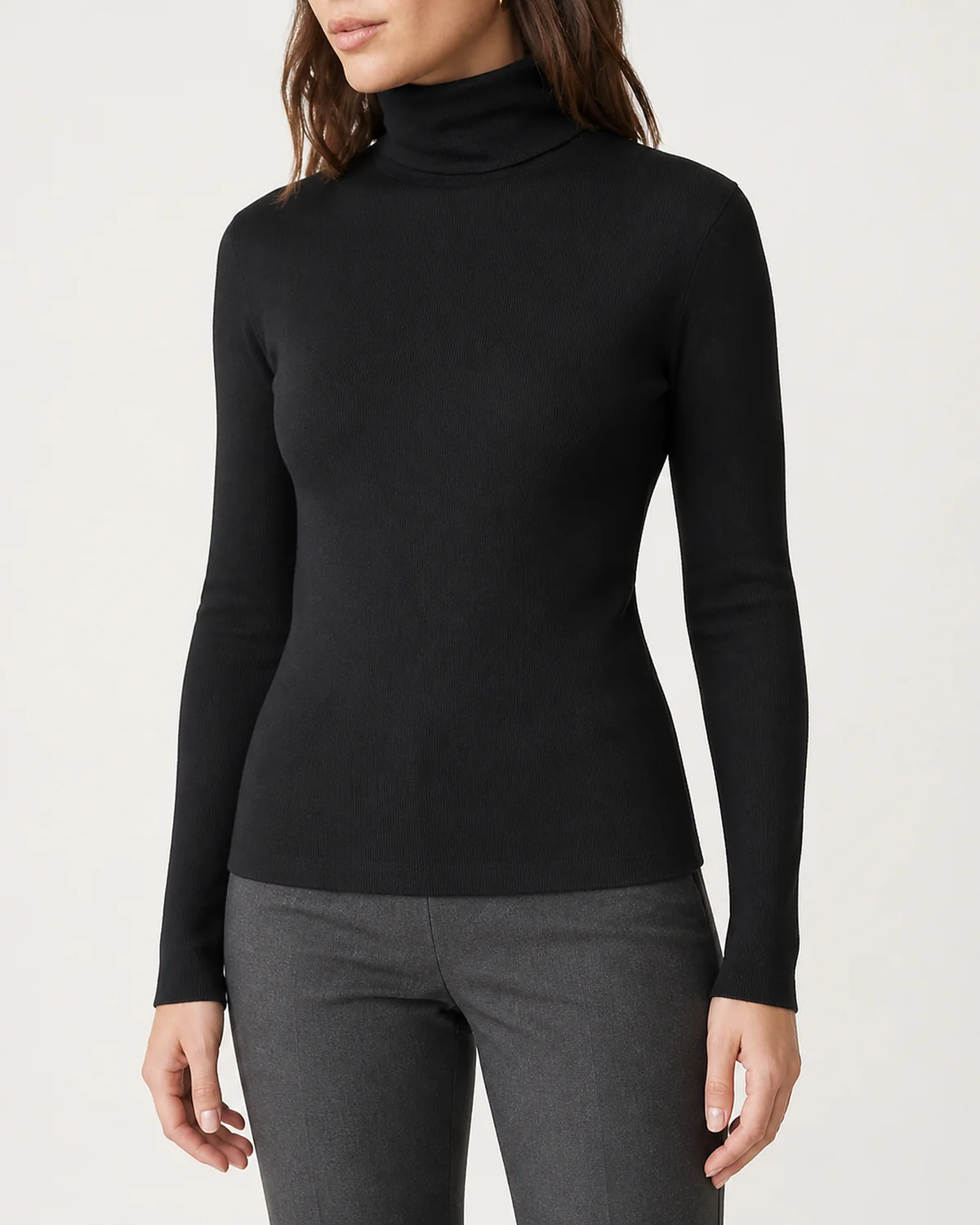 Large detail view of a knitted turtleneck sweater collar and rib structure