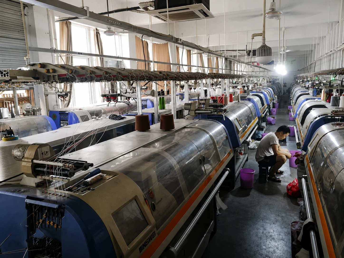 German STOLL computerized flat knitting machines for custom knitwear